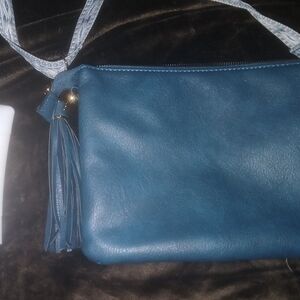 Elegant Teal Crossbody Bag with Tassel